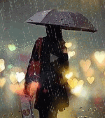 下雨天独自撑伞的女人